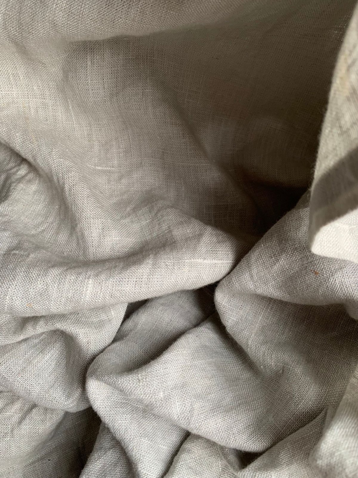 Natural folds and creases in linen fabric